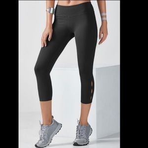 SOLD Fabletics Black Capri Keyhole Leggings